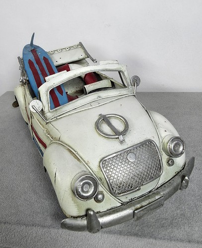 Vintage style metal beetle - style,